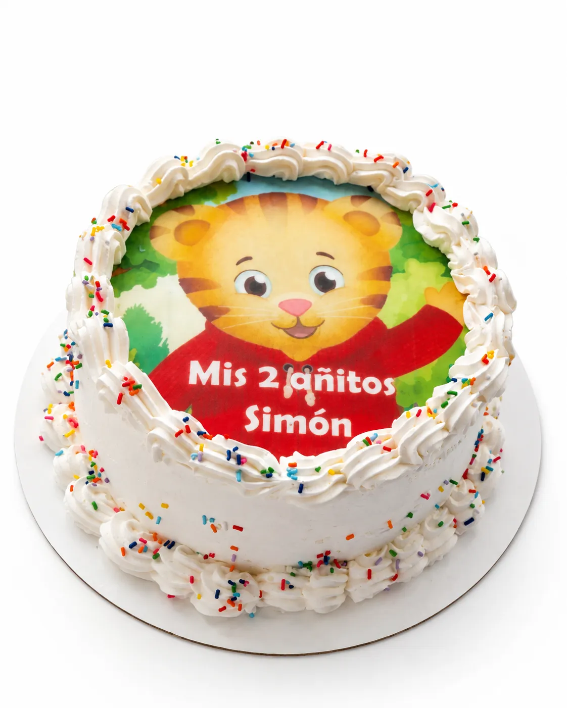 La misma torta del tigre de dibujitos con la frase «Mis 2 añitos Simón», vista de costado.